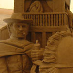 05-Jun-2005 - 10-Jul-2005 Italy, Venice (Jesolo). The international exhibition of sand sculpture. 'Hollywood' theme. 'Western' - Kuraev V.A. (height 3,5 m.)